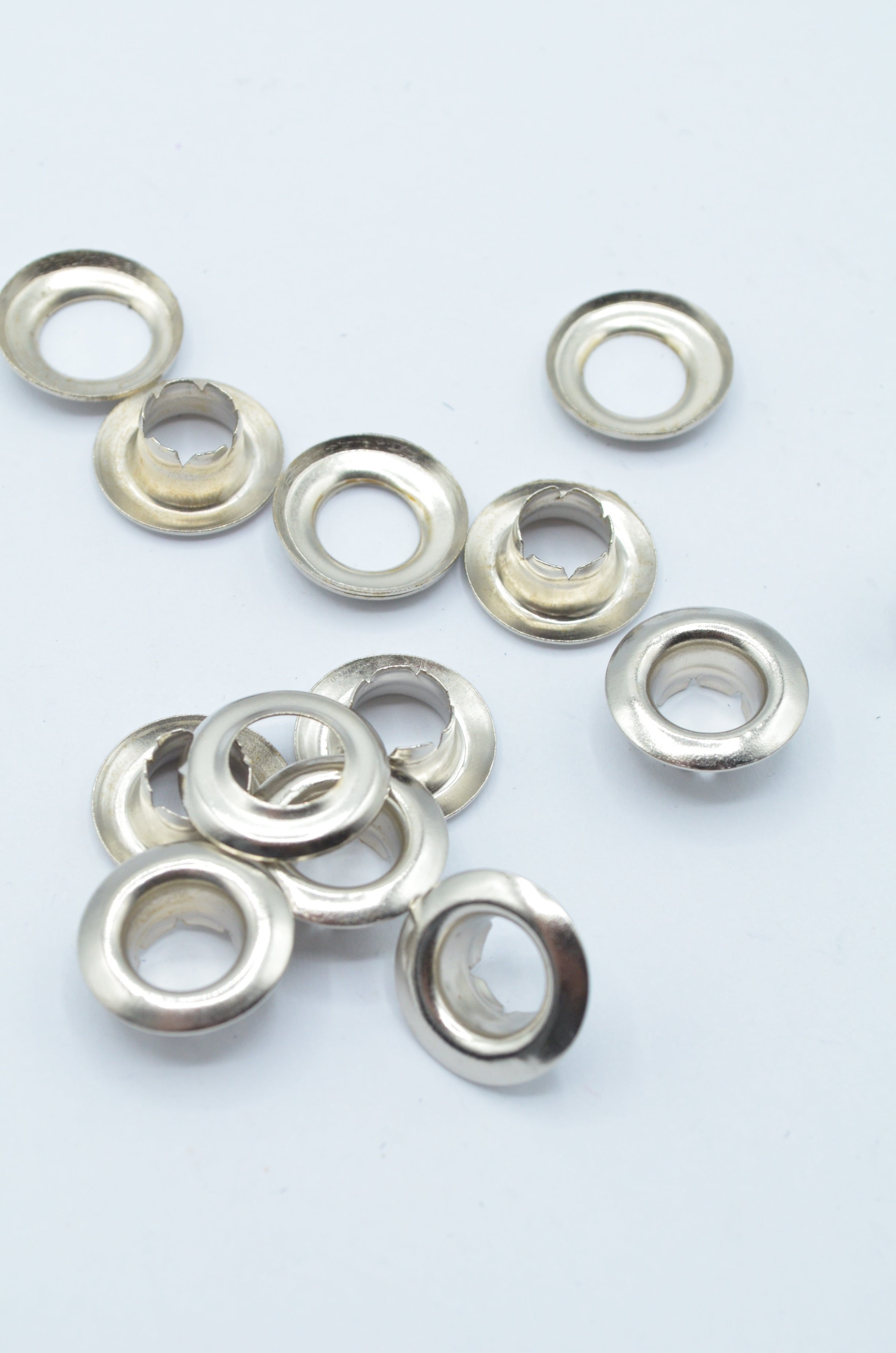 Ocheți metalici Ø10 mm interior/ Ø17 mm exterior, Argintii,