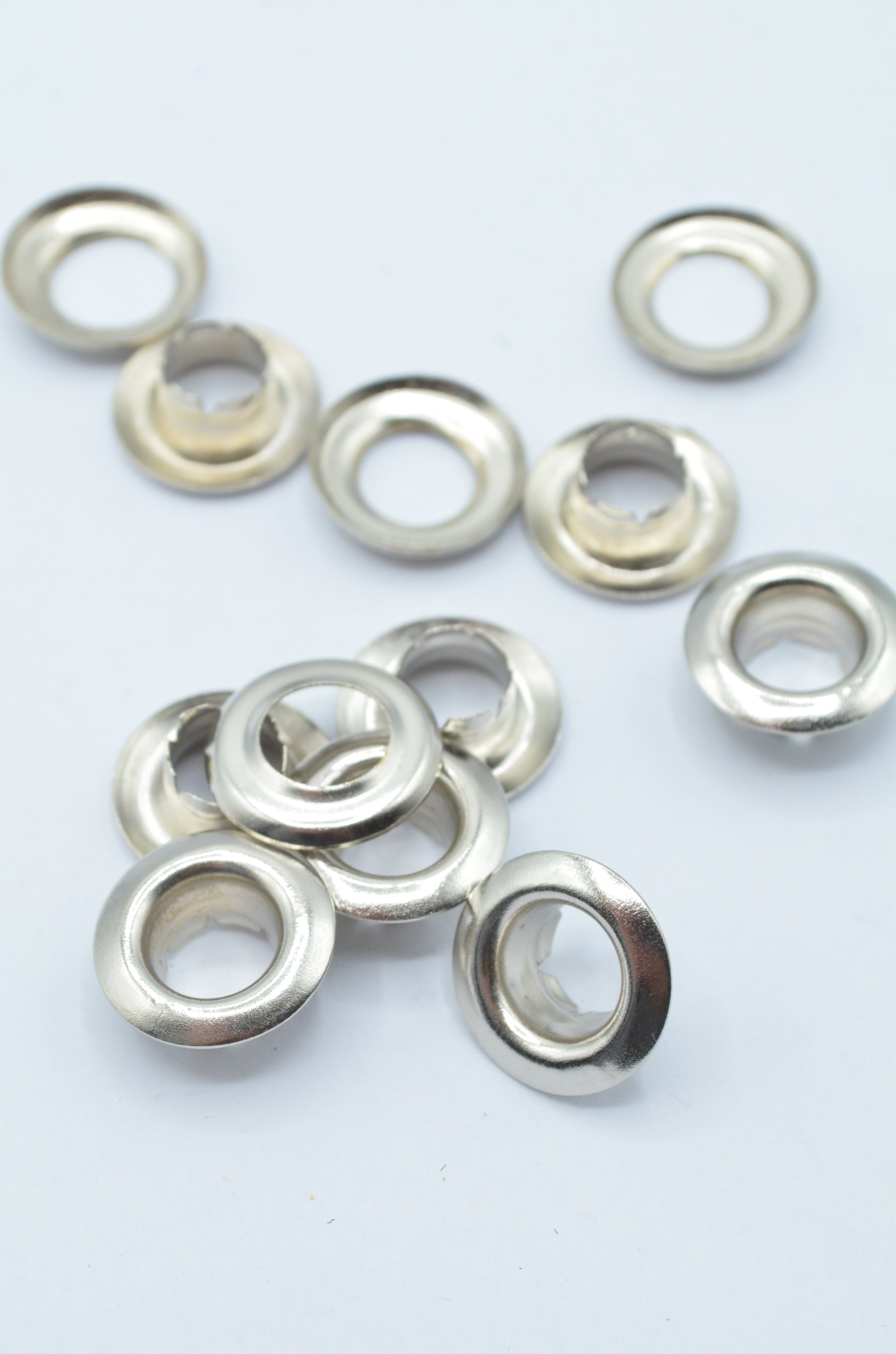 Ocheți metalici Ø10 mm interior/ Ø17 mm exterior, Argintii,