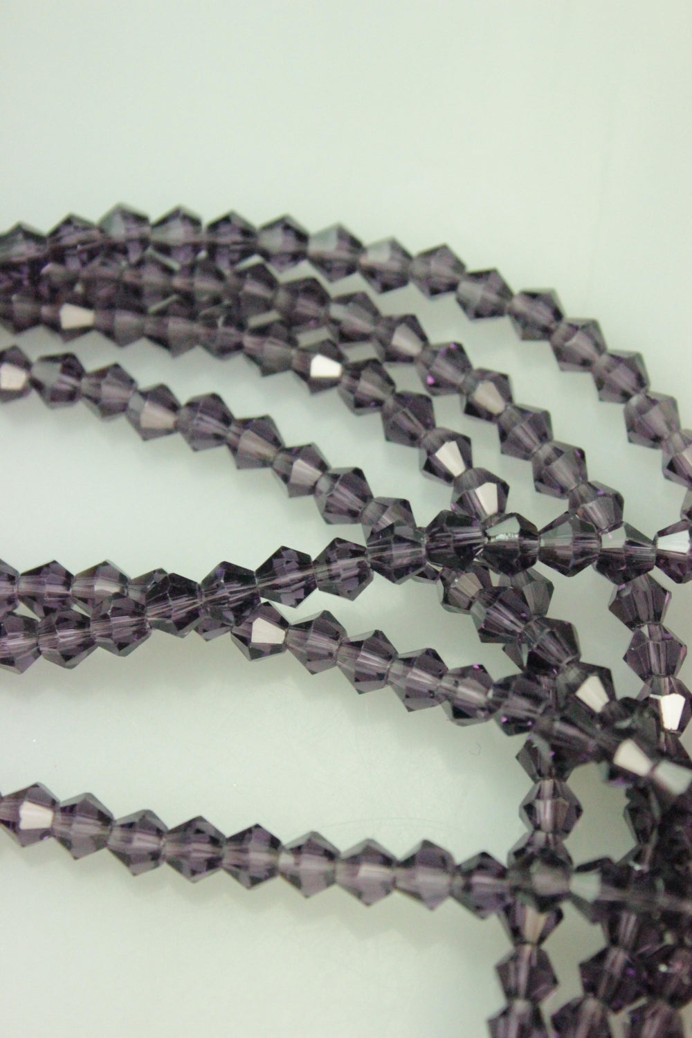 Cristale Biconice, 4mm, (12gr/Sirag), Mov Inchis