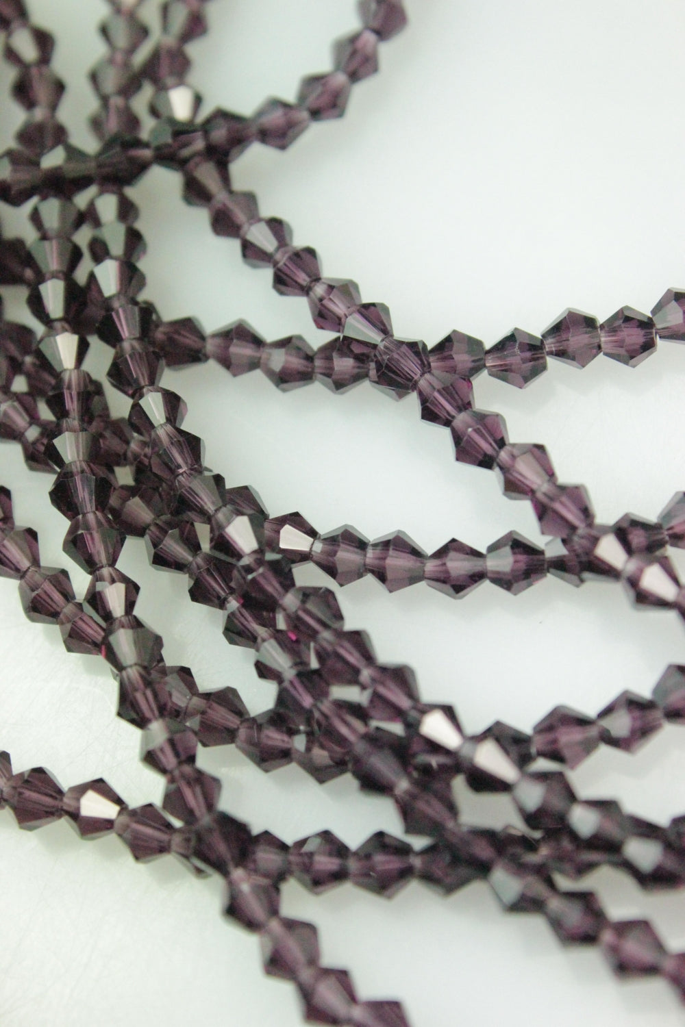 Cristale Biconice, 4mm, (12gr/Sirag), Maro
