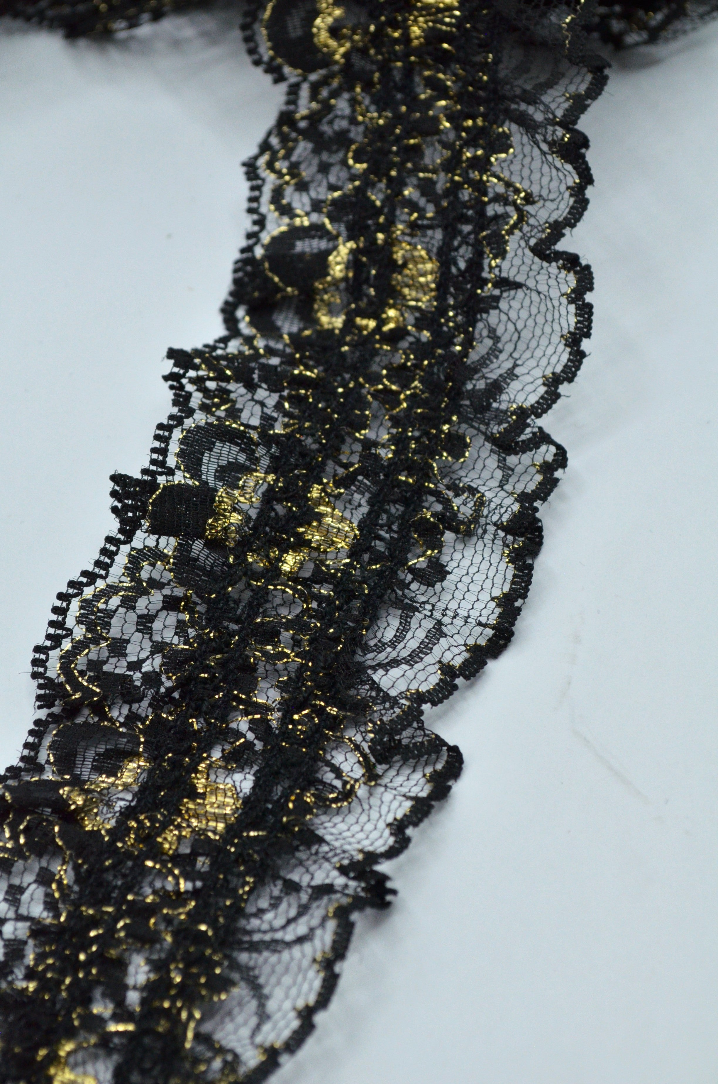 Pasmanterie Elastica Dantelata Negru Cu Auriu 60mm